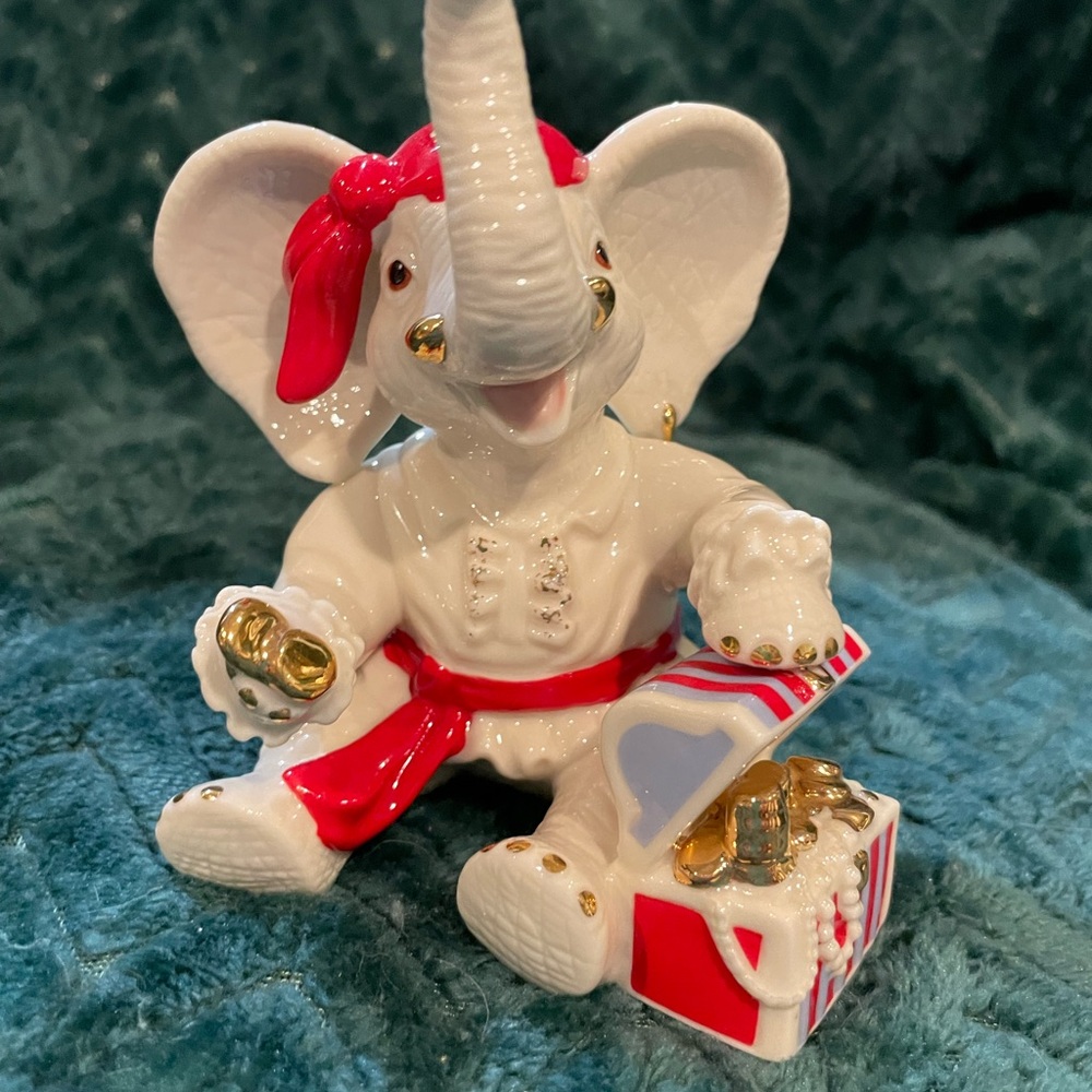 White Elephant Figurine with Red and Gold Accents